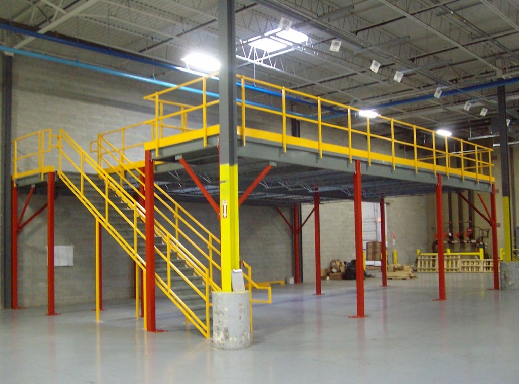 Free standing steel mezzanine adding a second level of usable space in a warehouse